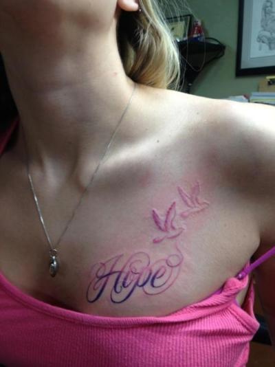 Hope tattoo on shoulder