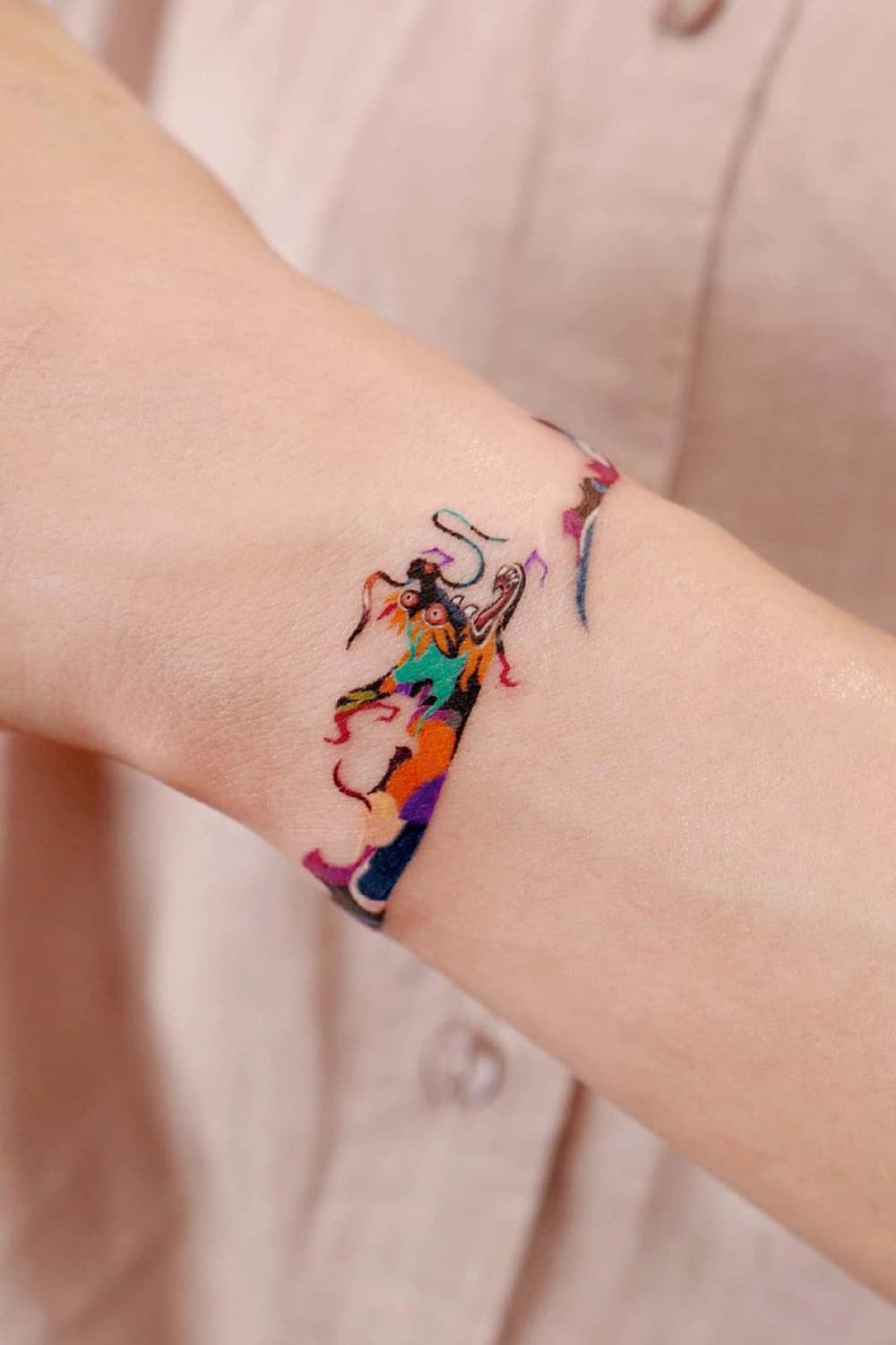 Dragon armband tattoo