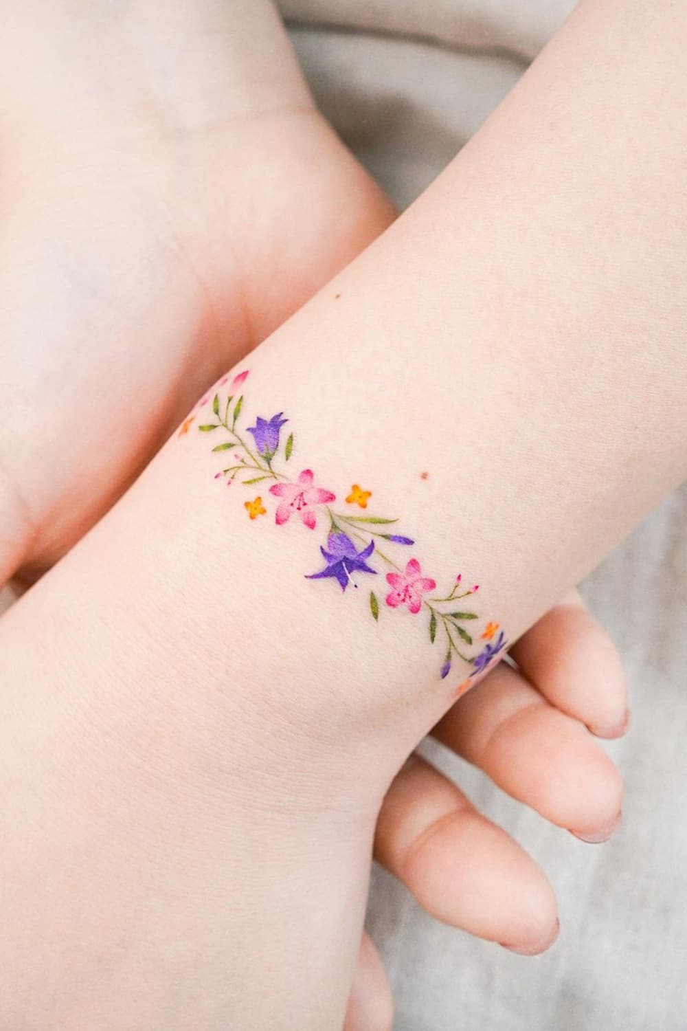 Beautiful flower bracelet tattoo
