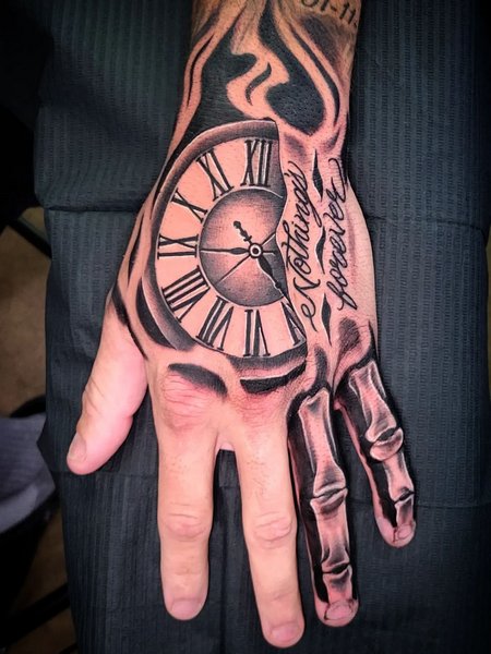 Clockd And Skeleton Hand Tattoo