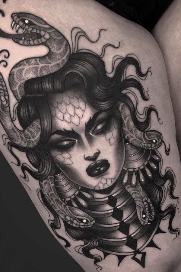 Dark Medusa tattoo on the front of thigh