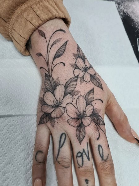 Flower Hand Tattoo