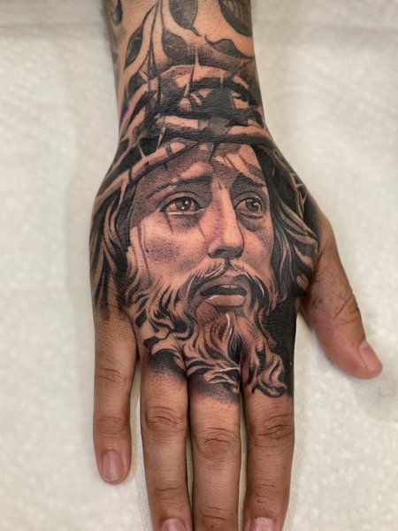 Jesus Hand Tattoo