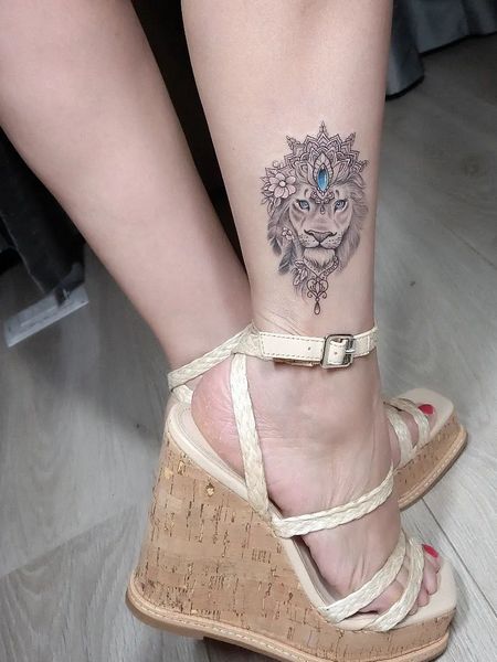 Lion Ankle Tattoo