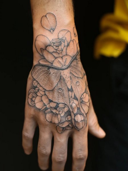 Moth Hand Tattoo