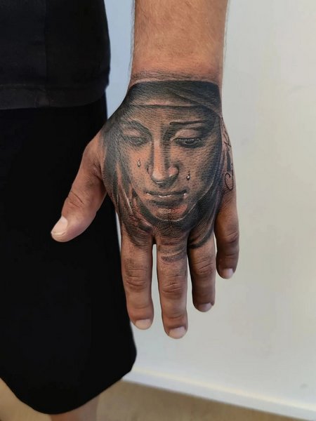 Religious Hand Tattoo