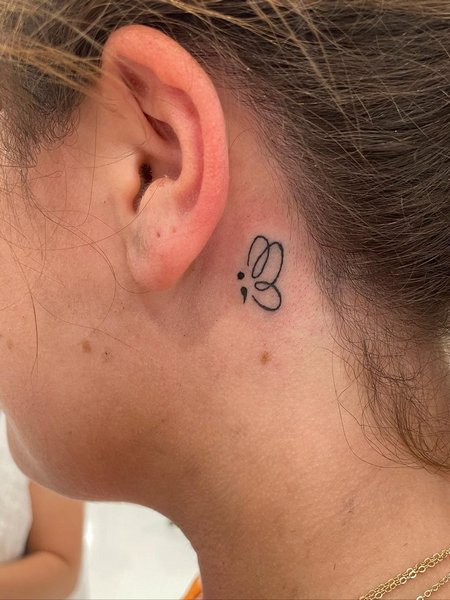 Simple Behind The Ear Tattoo