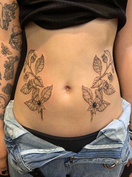 Stomach Flower Tattoo