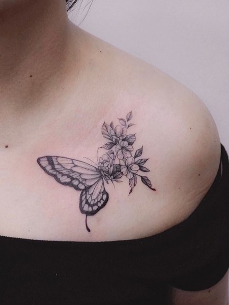 Butterfly Collarbone Tattoo