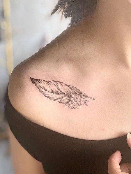 Feather Collarbone Tattoo