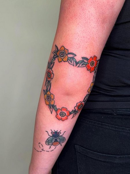 Flower Elbow Tattoo