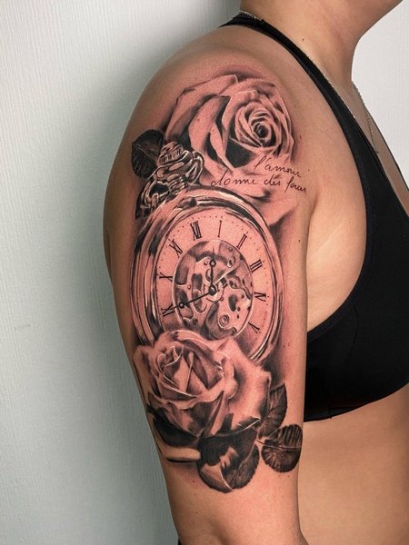 Half Sleeve Rose Tattoo