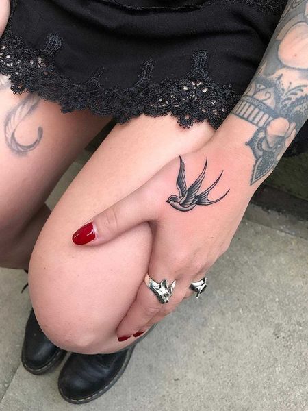 Hand Swallow Tattoo