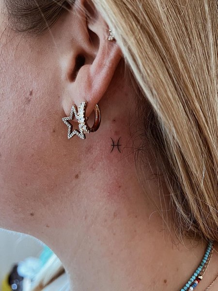 Pisces Behind The Ear Tattoo