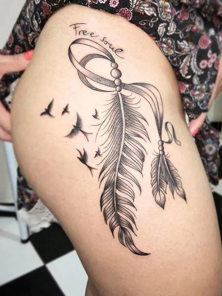 Thigh Feather Tattoo