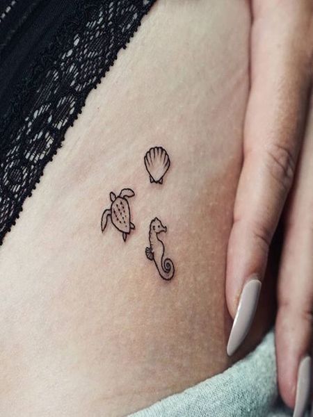 Tiny Seahorse Tattoo