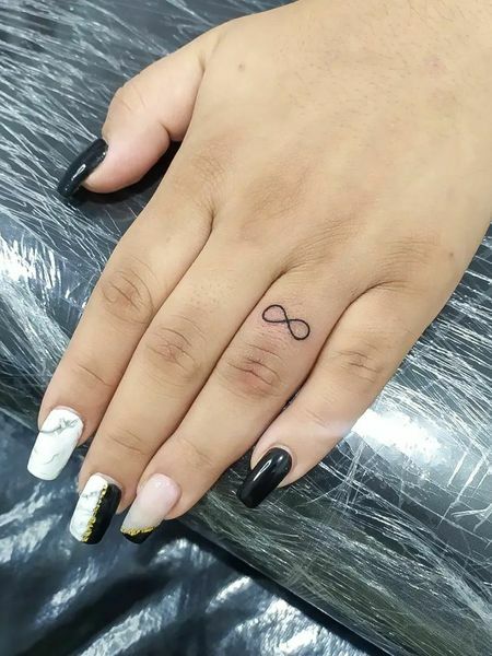 Infinity Finger Tattoo