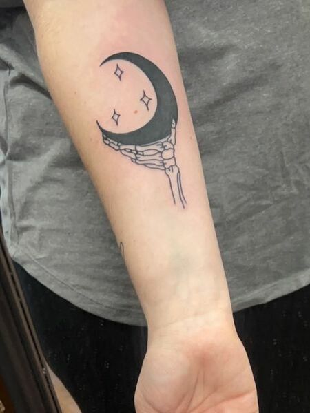 Moon And Skeleton Hand Tattoo