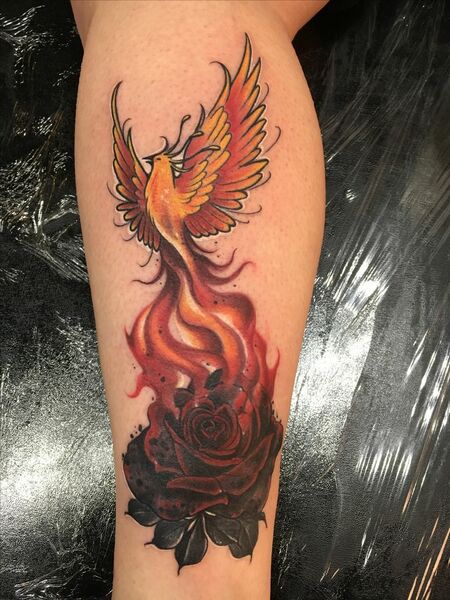 Phoenix Rising from Ashes Tattoo