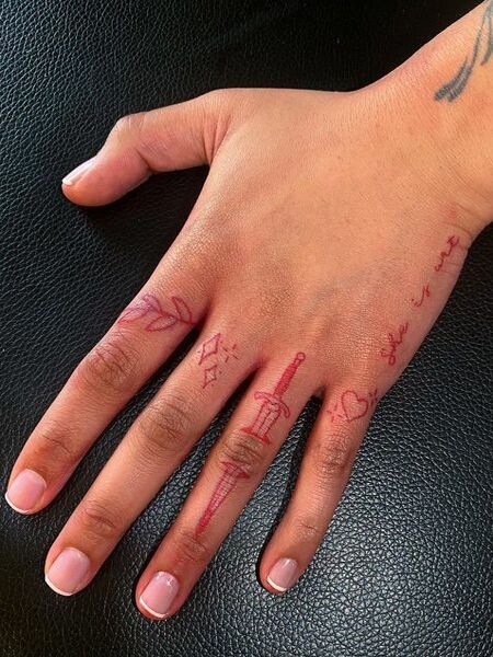 Red Finger Tattoo 1