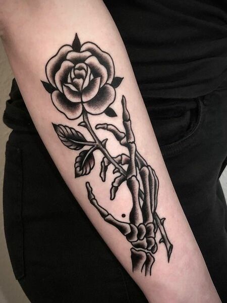 Skeleton Hand Tattoo on Arm