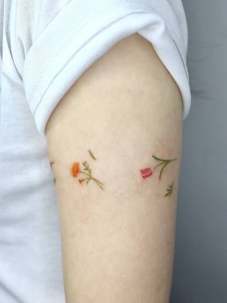 Small Flower Arm Tattoo