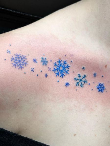 Snowflake Collarbone Tattoo