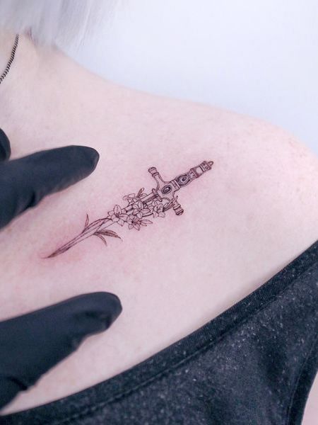 Sword Collarbone Tattoo