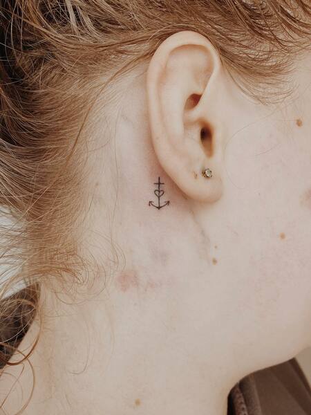 Tiny Behind The Ear Tattoo