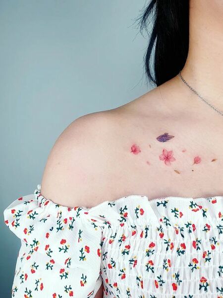 Tiny Cherry Blossom Tattoo
