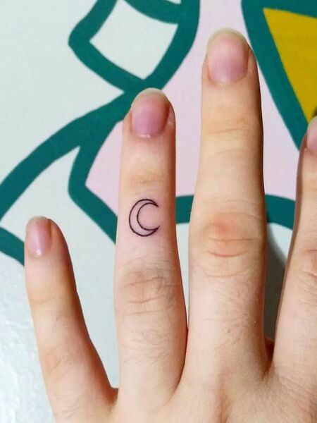 Tiny Finger Tattoo
