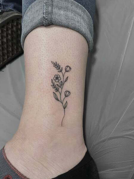 Tiny Flower Tattoo