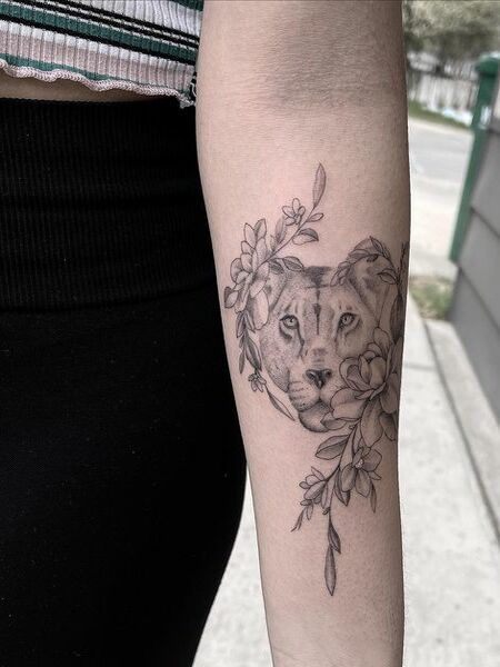 Tiny Lion Tattoo
