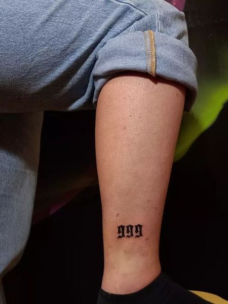 999 Tattoo On ankle