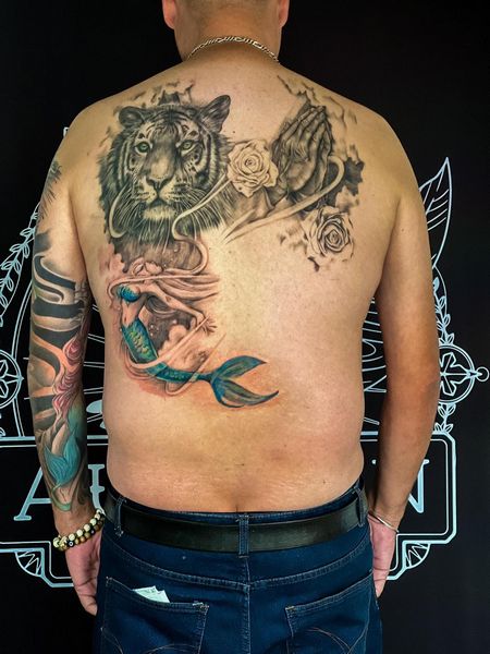 Back mermaid tattoo