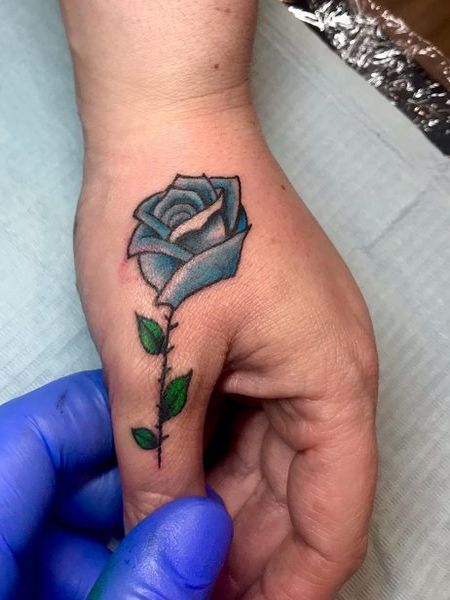 Blue Rose Tattoo On Finger