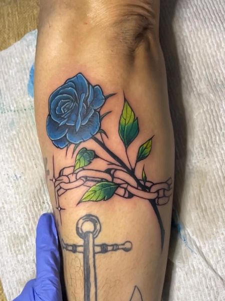 Blue Rose Tattoo On Forearm