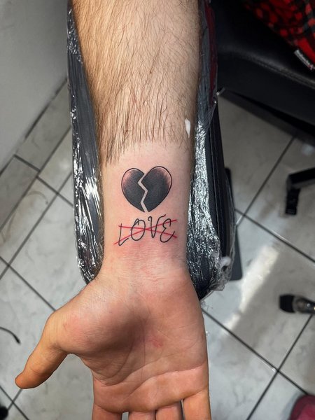 Broken Heart Tattoo On Wrist