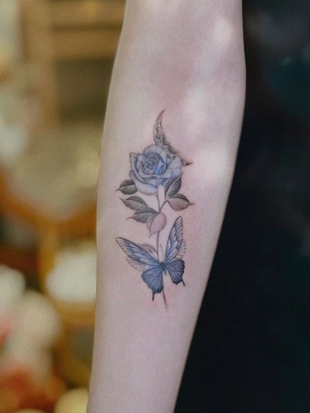 Butterfly And Blue Rose Tattoo