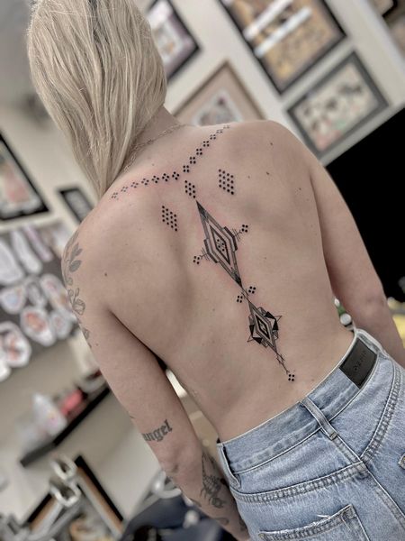 Feminine Spine Tattoo