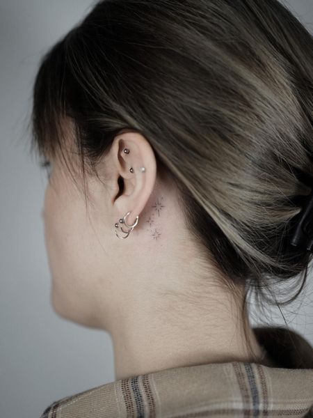 Fine Line Behind The Ear Tattoo