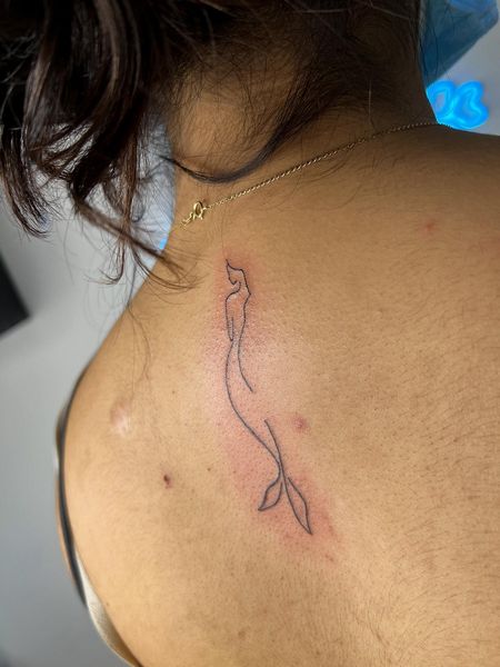 Fine Line mermaid tattoo