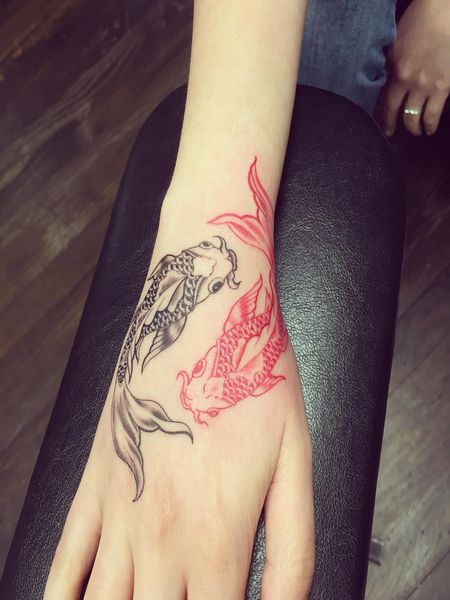 Koi Fish Hand Tattoo