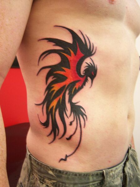 Phoenix Rib Tattoo