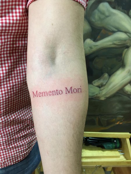 Red Ink Memento Mori Tattoo