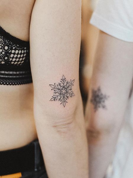 Snowflake Arm Tattoo