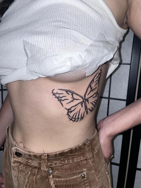 Tribal Butterfly Tattoo