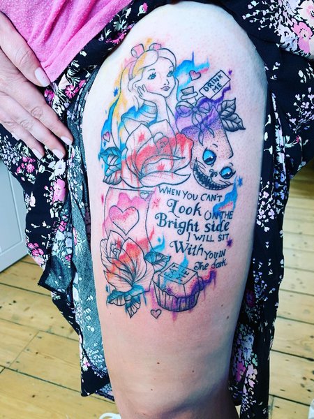 Alice In Wonderland Tattoo On Thigh