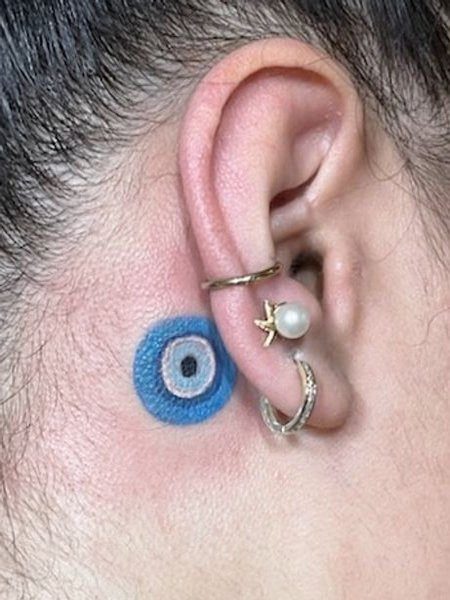 Evil Eye Tattoo Behind Ear