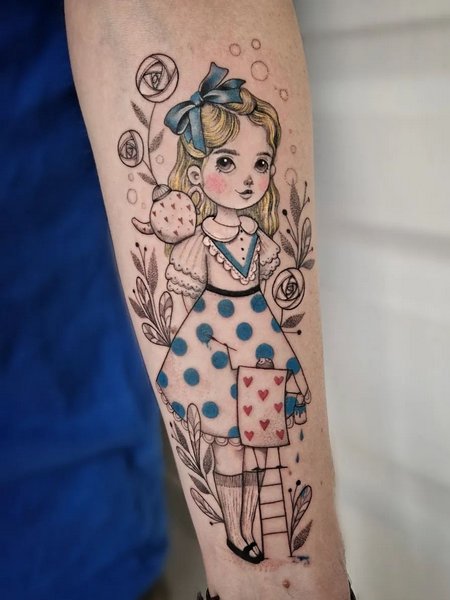 Female Alice In Wonderland Tattoo